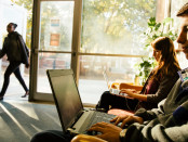 Roanoke College students using laptops.