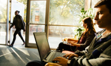 Roanoke College students using laptops.